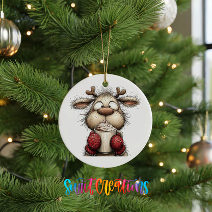 woodland reindeer wearing red mittens ceramic Christmas ornament hanging on a lit Christmas tree