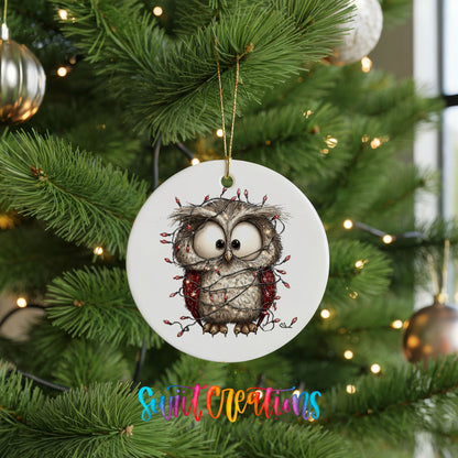 woodland owl wrapped in colorful Christmas lights ceramic Christmas ornament hanging on a lit Christmas tree