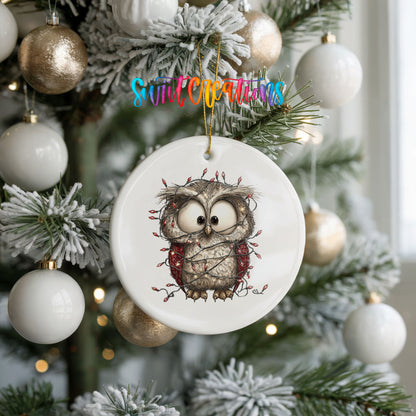 woodland owl wrapped in colorful Christmas lights ceramic Christmas ornament hanging on a frosted tree with ornaments