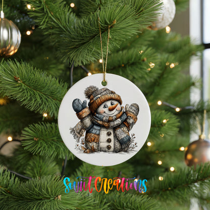 cheerful snowman in a knit hat and blue mittens ceramic Christmas ornament hanging on a lit Christmas tree