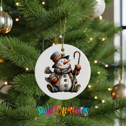 playful snowman in a top hat with a candy cane ceramic Christmas ornament hanging on a lit Christmas tree