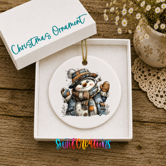 cheerful snowman in a striped knit hat ceramic Christmas ornament presented in a gift box