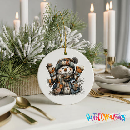 cheerful snowman raising striped winter mittens ceramic Christmas ornament shown in a holiday table setting
