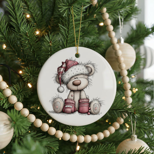 Teddy Bear in a Santa Hat with Gifts ceramic Christmas ornament, front view