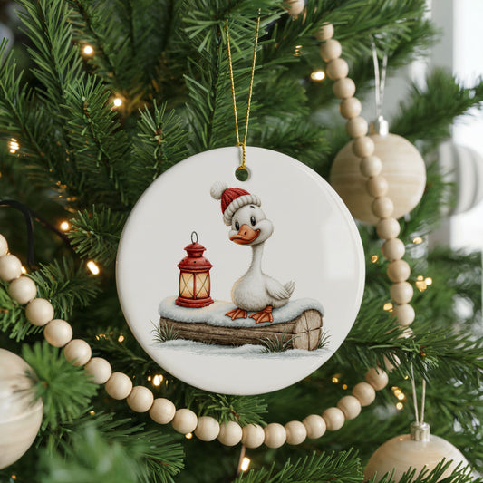 Christmas Goose with a Red Lantern ceramic Christmas ornament, front view