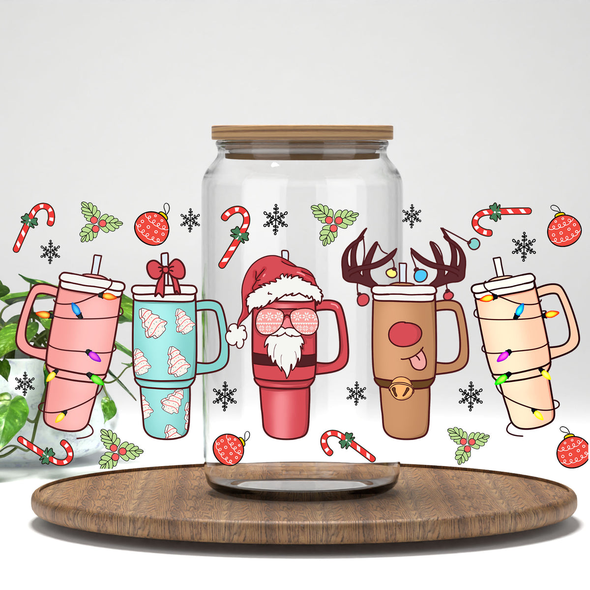 Christmas Tumblers UV DTF full wrap on a clear glass can