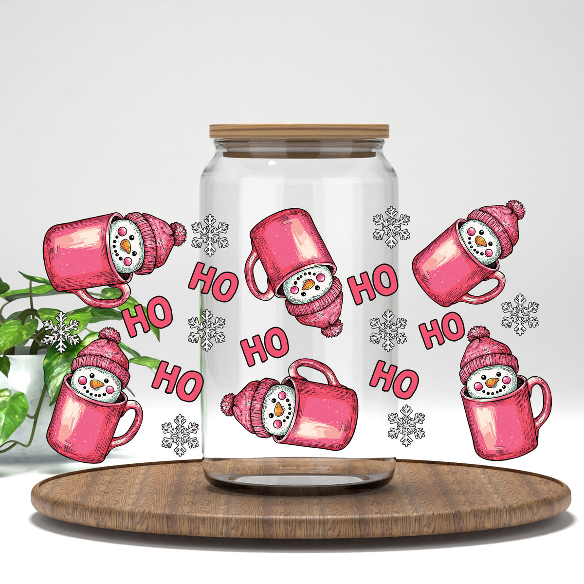 Ho Ho Pink Snowman Mugs UV DTF wrap on a clear glass can