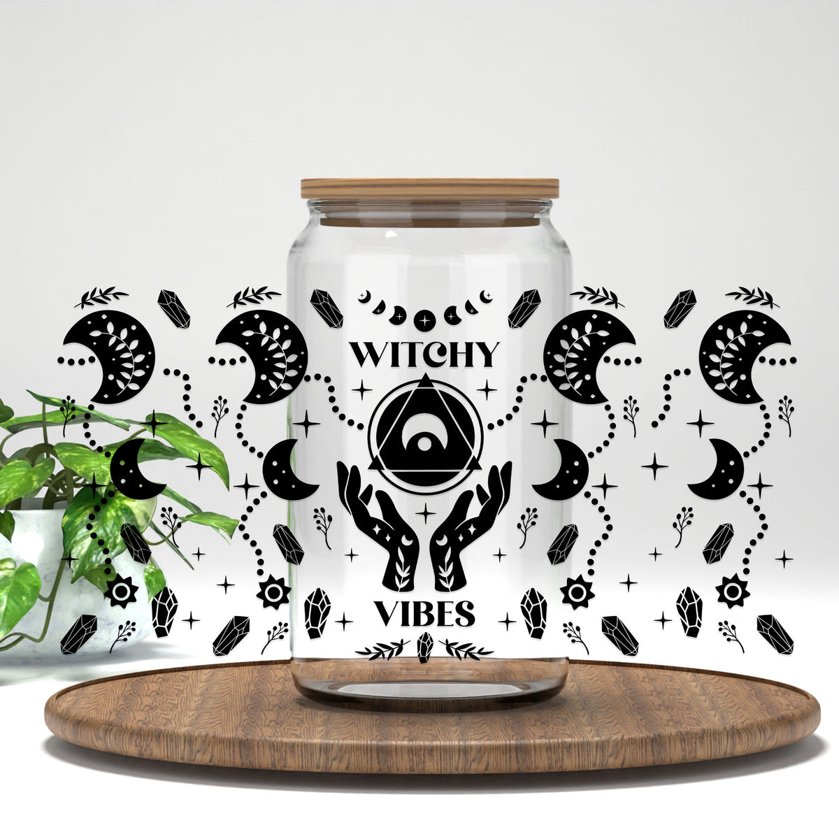 Witchy Vibes UV DTF wrap on a clear glass can
