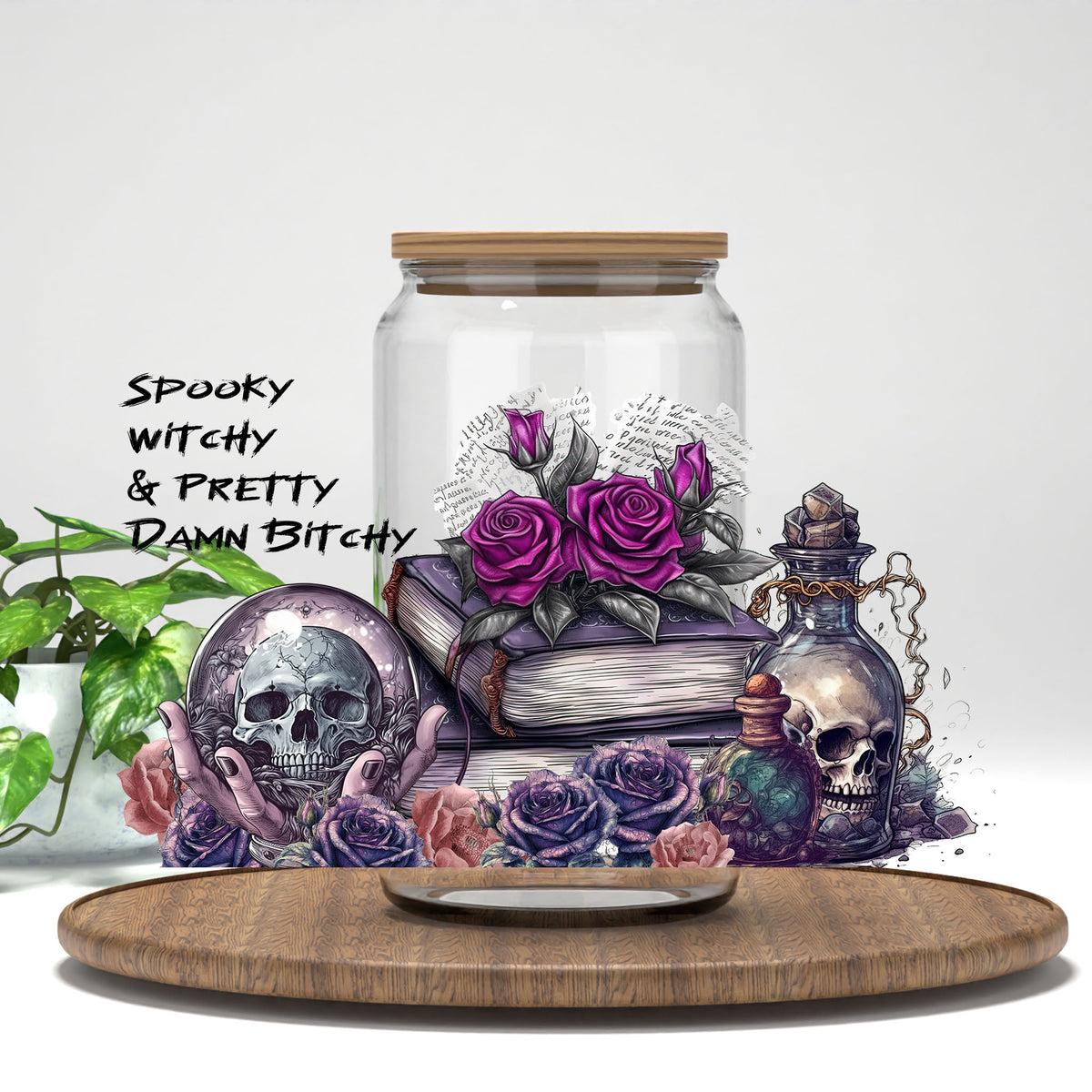 Spooky Witchy and Pretty Damn B*tchy UV DTF wrap on a clear glass can