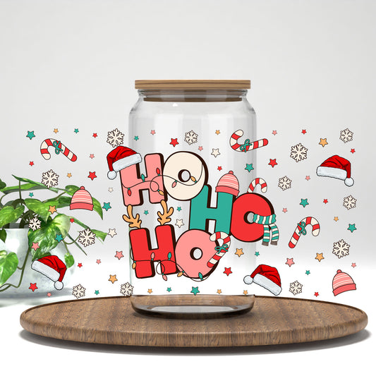 Ho Ho Ho Santa Hats UV DTF wrap on a clear glass can
