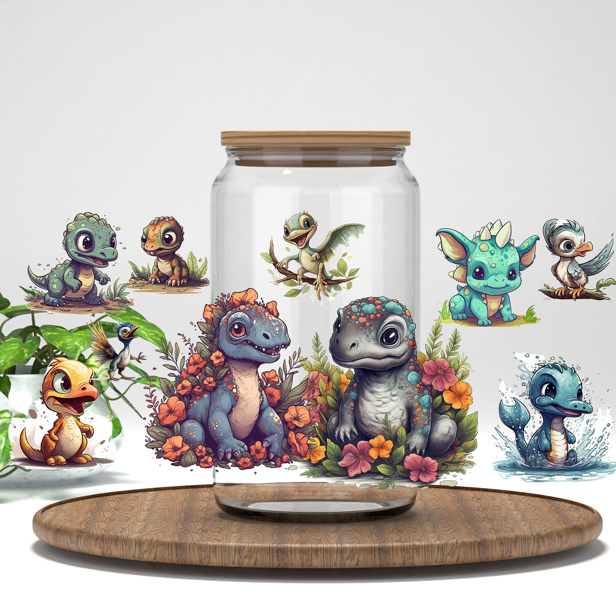 Cute Baby Dinosaurs UV DTF wrap on a clear glass can