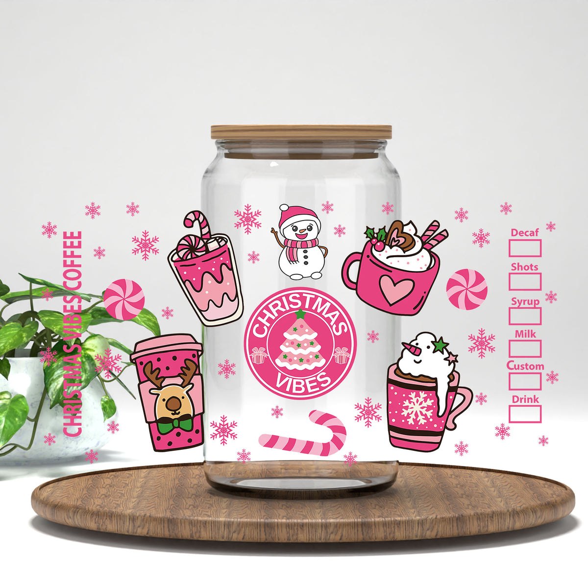 Christmas Vibes Coffee UV DTF wrap on a clear glass can