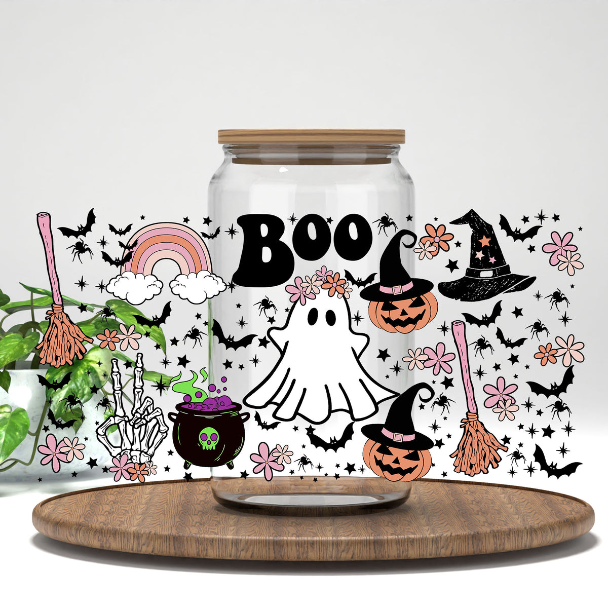 Boo UV DTF wrap on a clear glass can