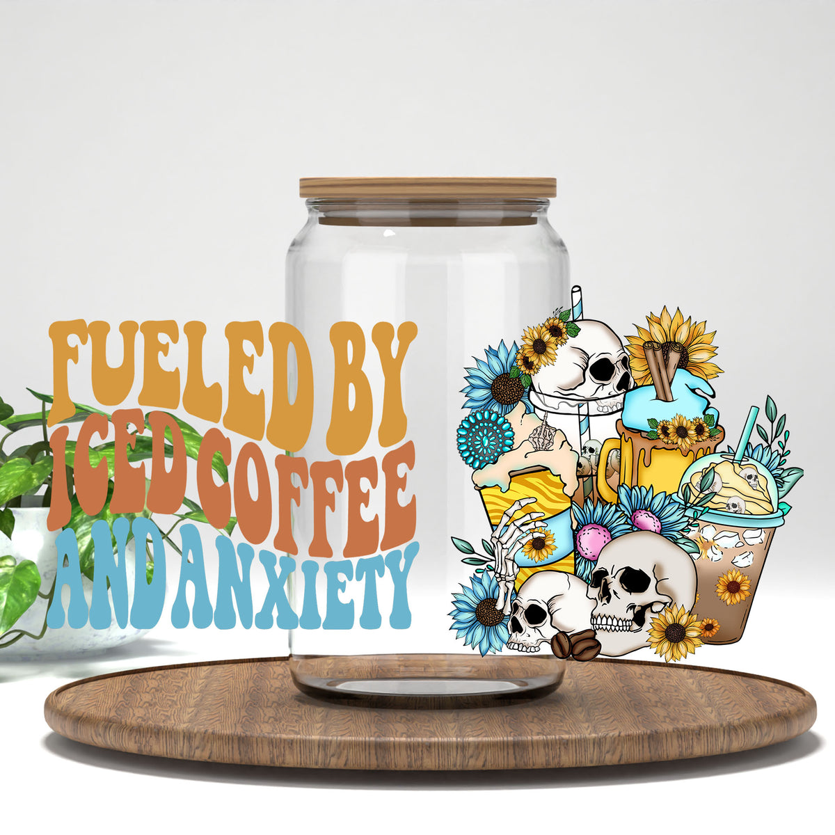 Fueled by Iced Coffee and Anxiety UV DTF wrap on a clear glass can