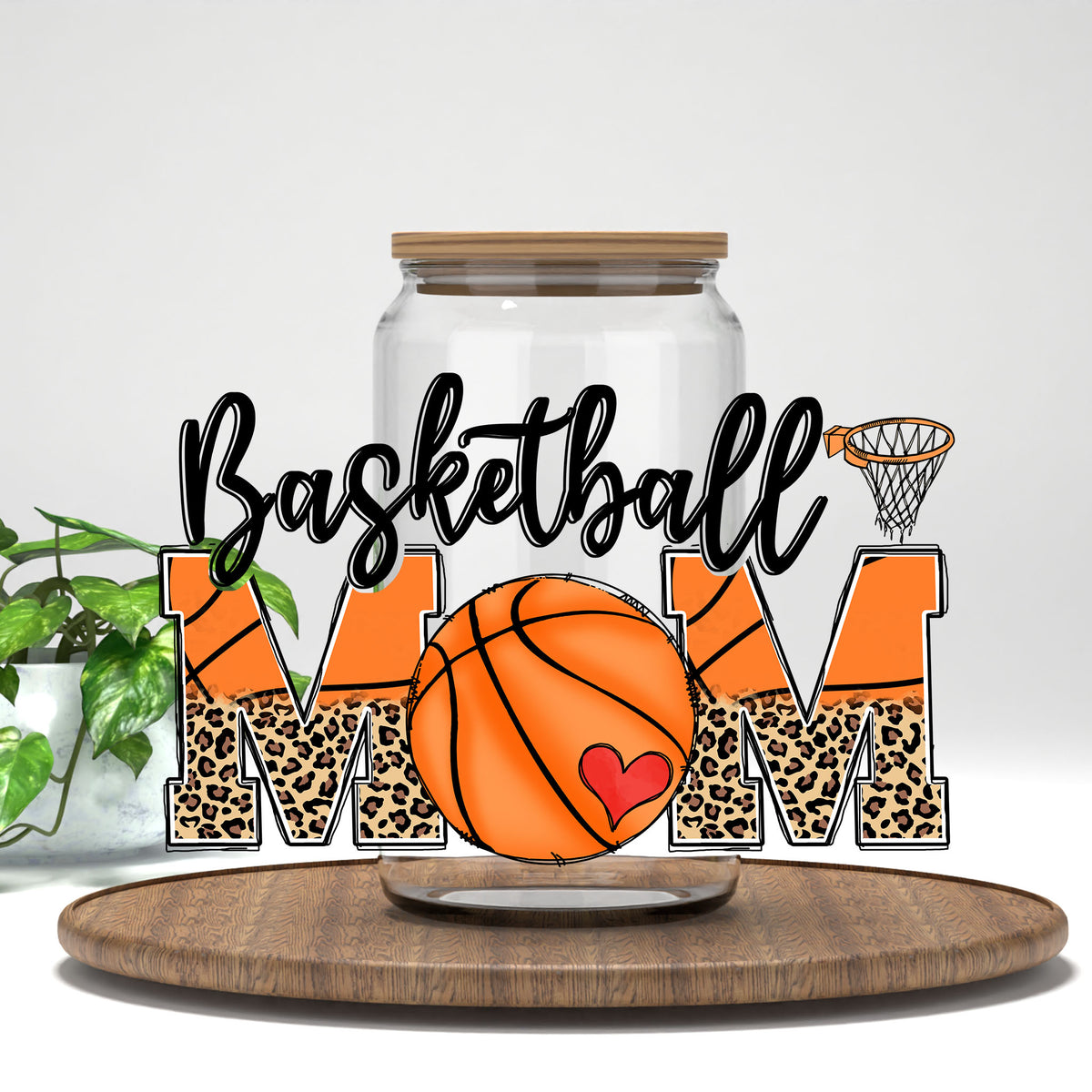 Basketball Mom UV DTF wrap on a clear glass can