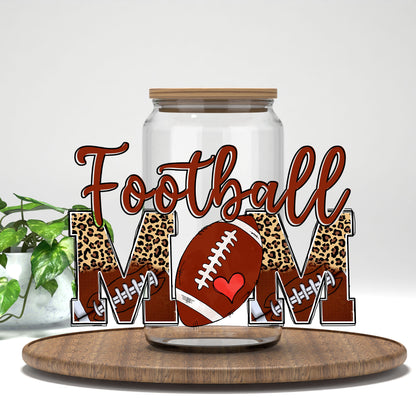 Football Mom UV DTF wrap on a clear glass can