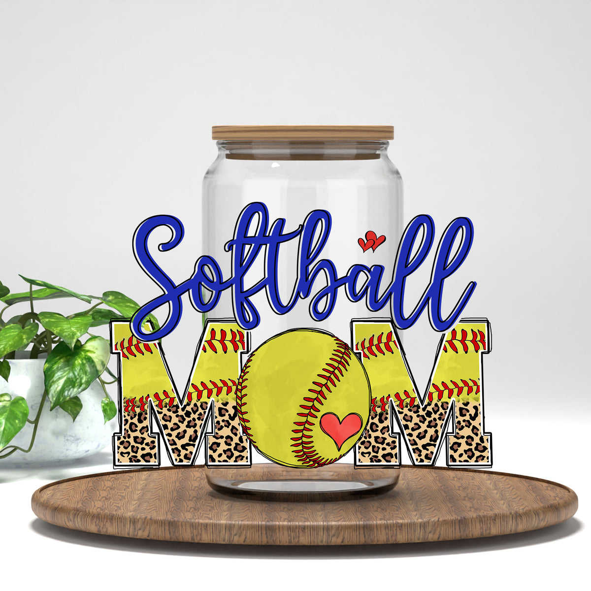 Softball Mom leopard letters UV DTF wrap on a clear glass can