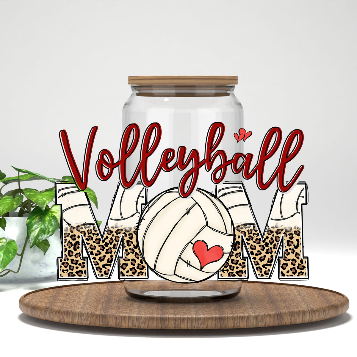 Volleyball Mom UV DTF wrap on a clear glass can