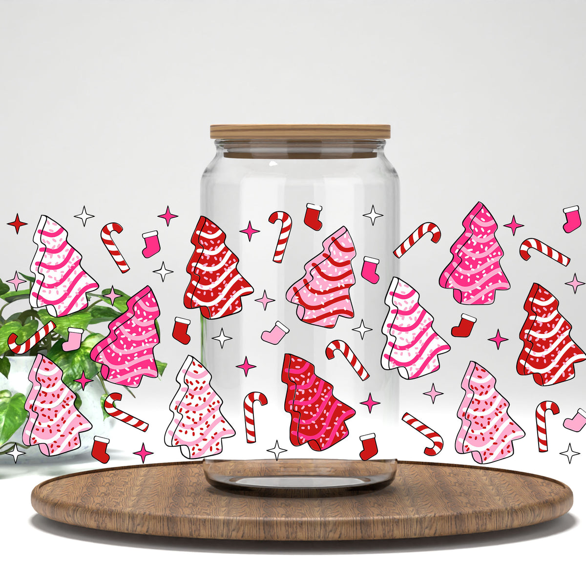Pink Christmas Tree Cakes UV DTF full wrap on a clear glass can