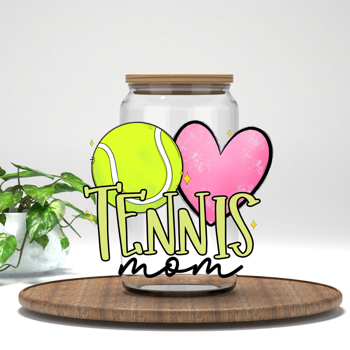 Tennis Mom UV DTF wrap on a clear glass can
