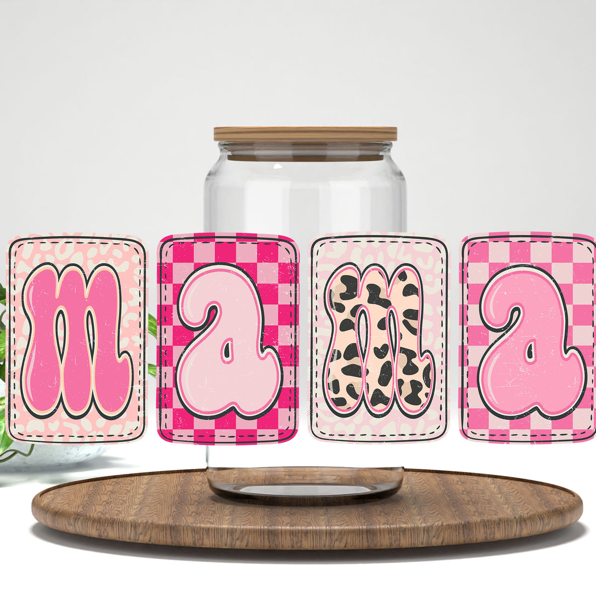 Mama pink checkered patches UV DTF wrap on a clear glass can