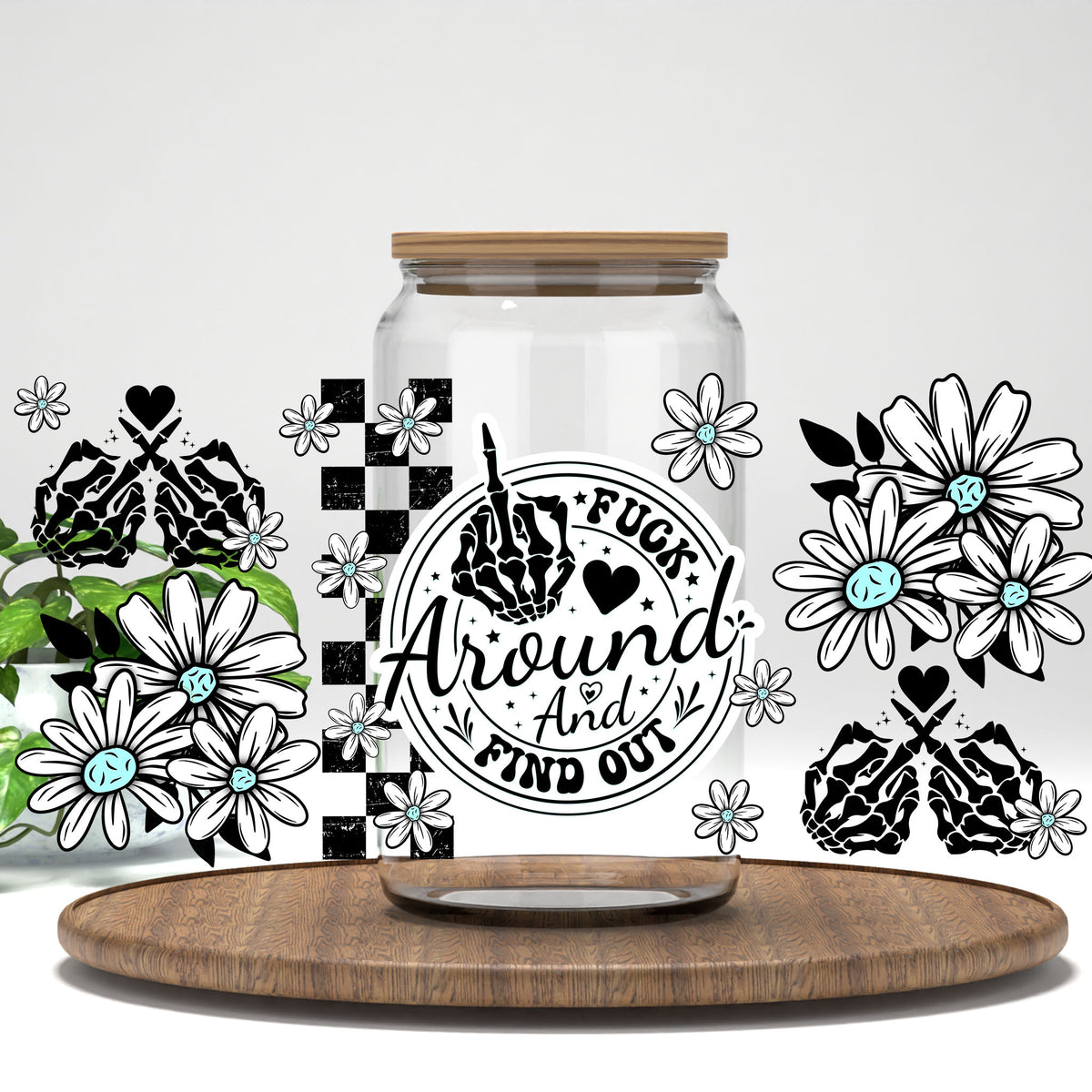 F*ck Around and Find Out floral skeleton hands UV DTF full wrap on a clear glass can
