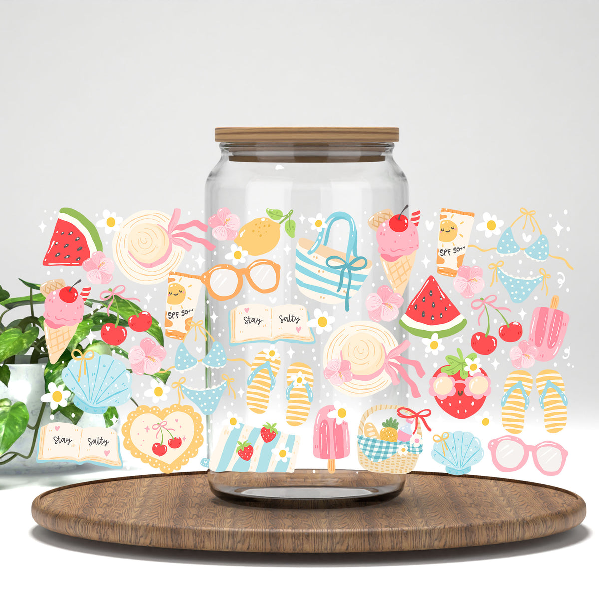 Summer Beach UV DTF wrap on a clear glass can