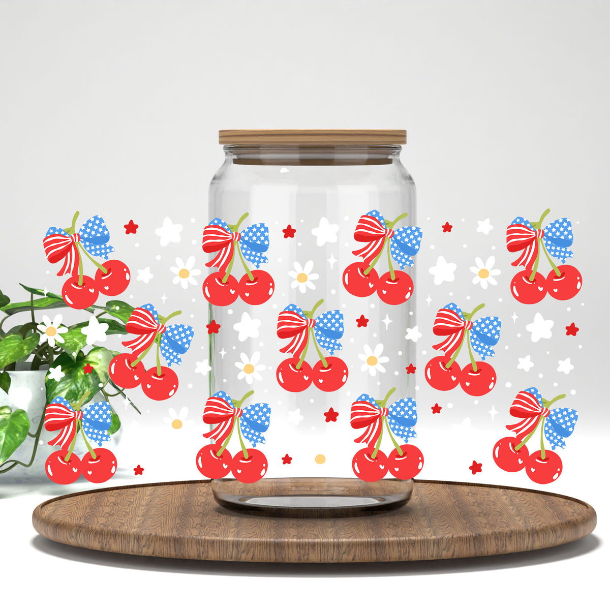 4th of July Cherries UV DTF wrap on a clear glass can
