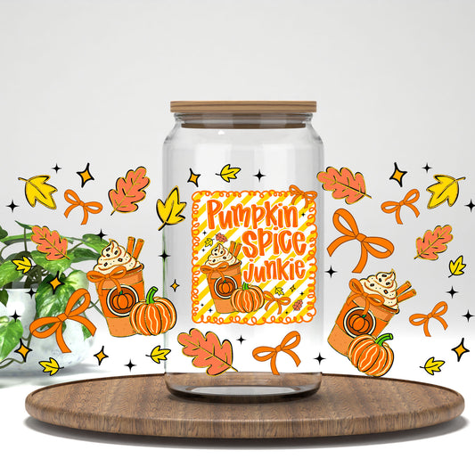 Pumpkin Spice Junkie UV DTF wrap on a clear glass can