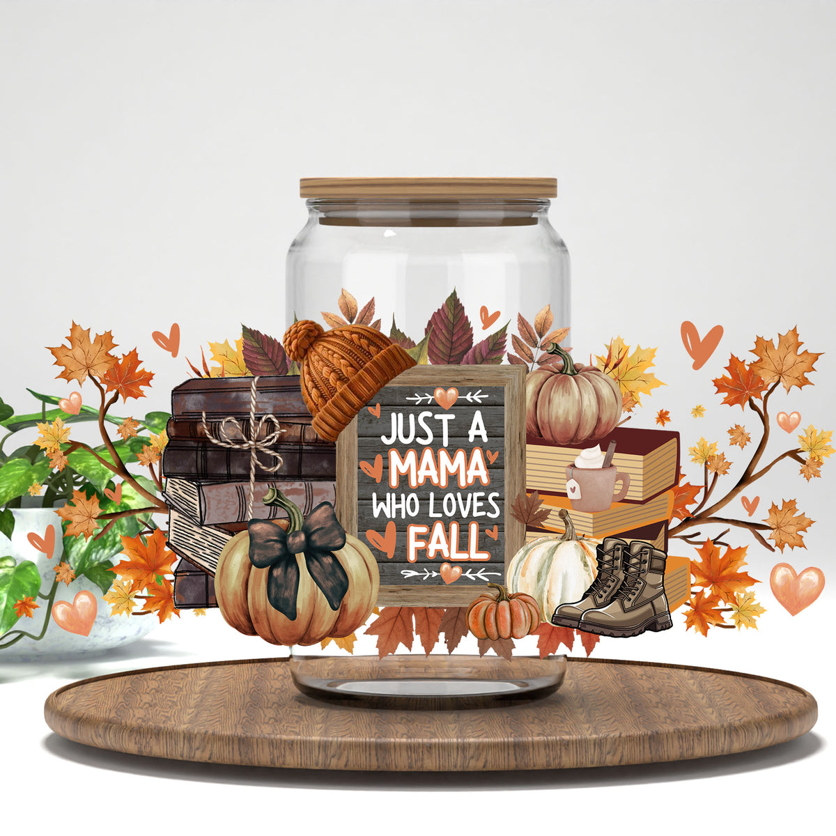 Just a Mama Who Loves Fall UV DTF full wrap on a clear glass can
