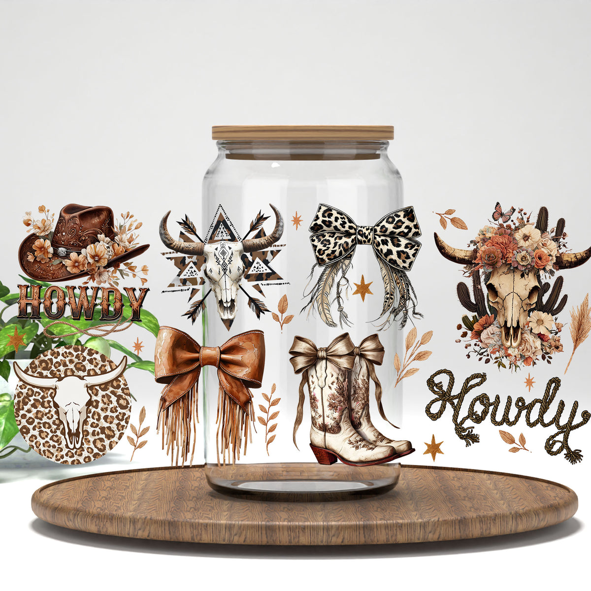 Howdy cowgirl boots, bows, and leopard skull UV DTF full wrap on a clear glass can