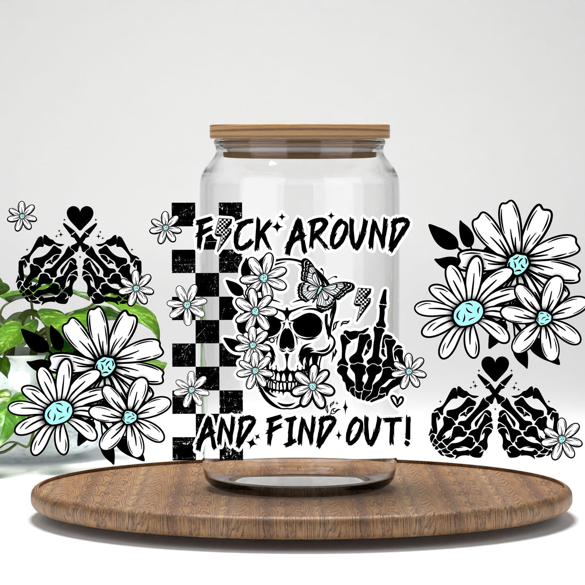 F*ck Around and Find Out skull and daisies UV DTF full wrap on a clear glass can