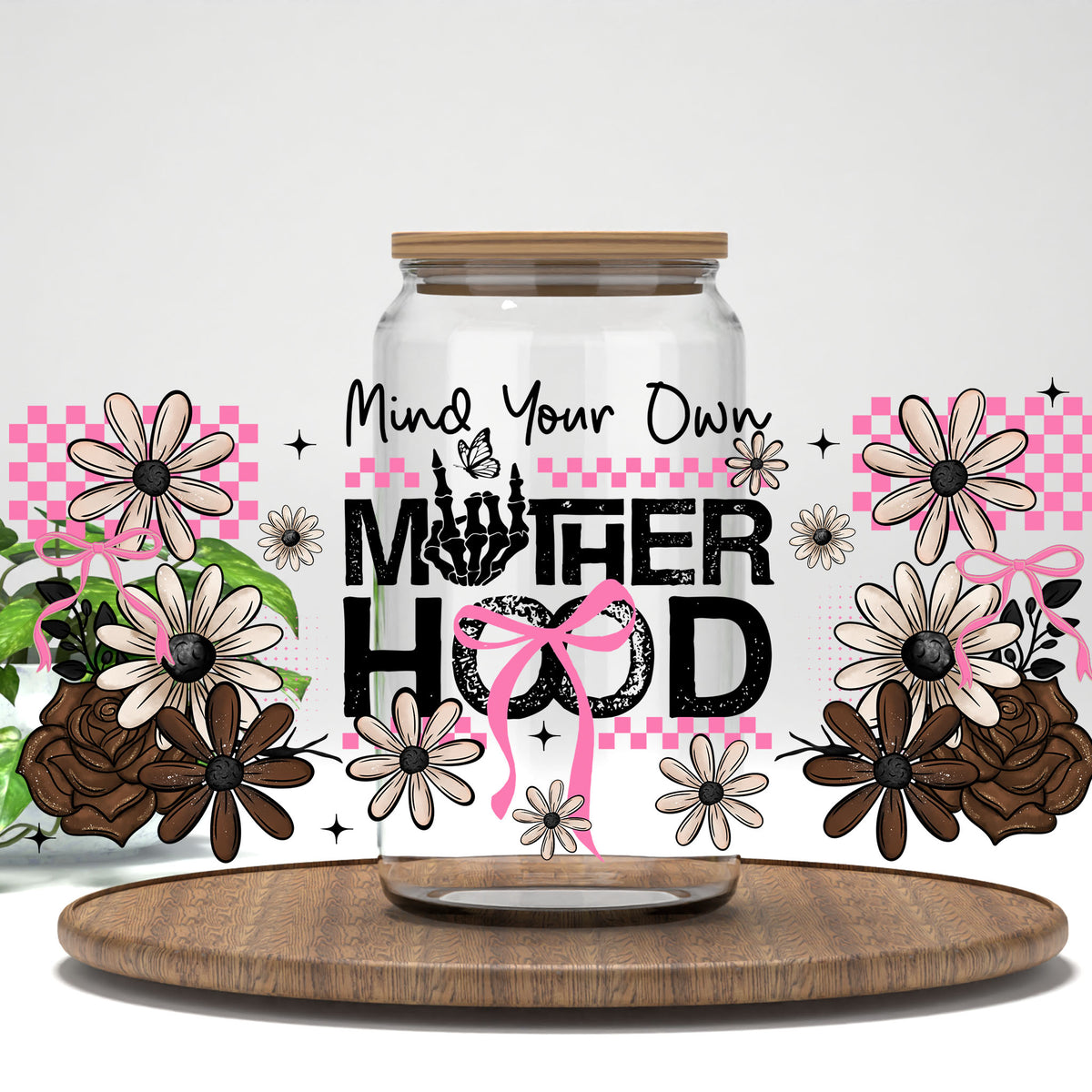 Mind Your Own Motherhood UV DTF full wrap on a clear glass can