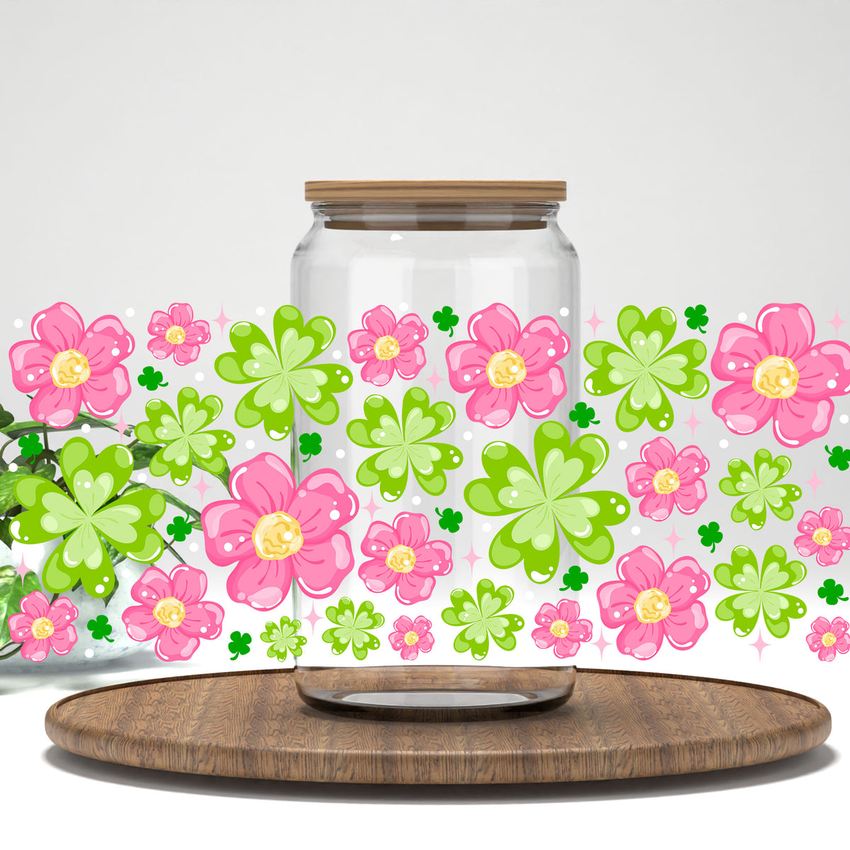 Pink Flowers and Clovers UV DTF full wrap on a clear glass can