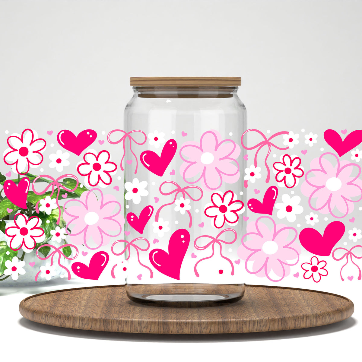 Pink Valentine Floral Hearts and Bows UV DTF full wrap on a clear glass can