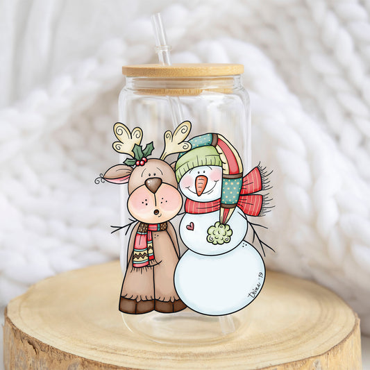 Reindeer and Snowman design on a 16 oz glass tumbler