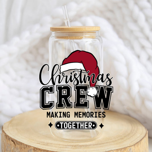 Christmas Crew design on a 16 oz glass tumbler