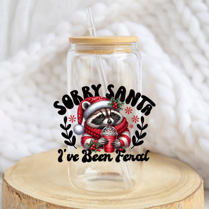 Sorry Santa I Have Been Feral Raccoon design on a 16 oz glass tumbler