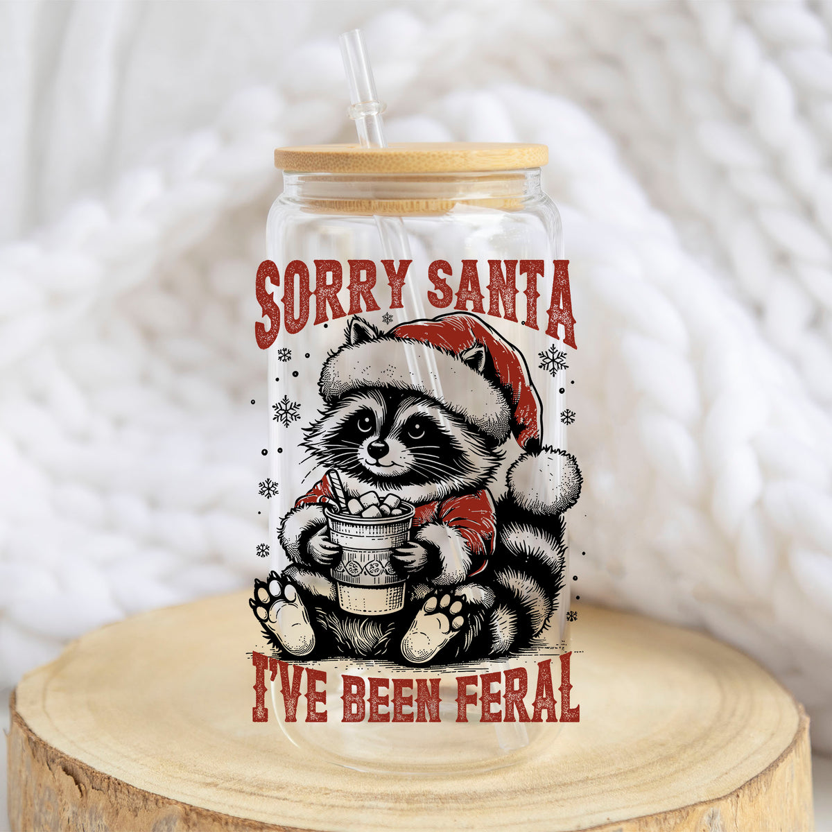 Sorry Santa I've Been Feral design on a 16 oz glass tumbler