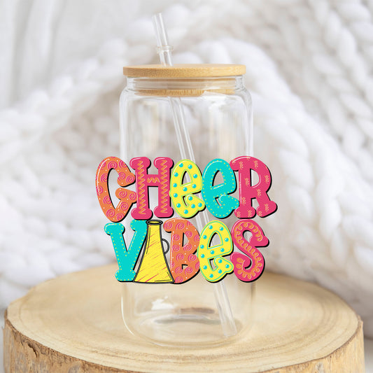 Cheer Vibes design on a 16 oz glass tumbler