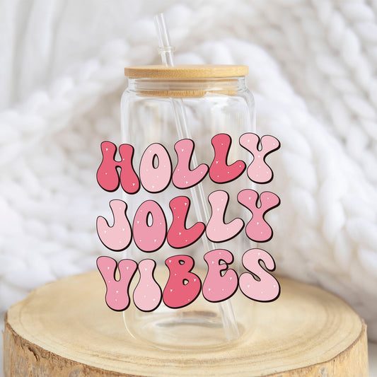 Holly Jolly Vibes design on a 16 oz glass tumbler