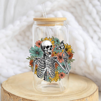 Retro Floral Skeleton design on a 16 oz glass tumbler