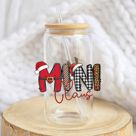 Mini Claus design on a 16 oz glass tumbler