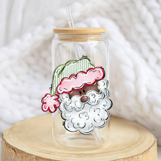 Pink and Green Santa Face design on a 16 oz glass tumbler
