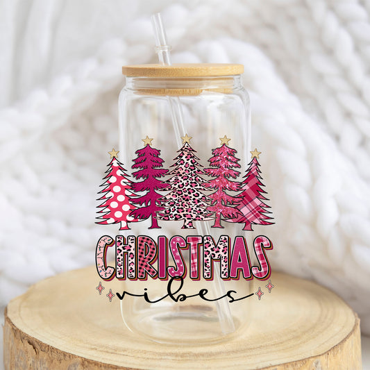 Christmas Vibes design on a 16 oz glass tumbler