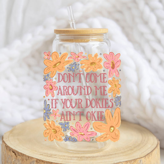 If Your Dokies Ain't Okie design on a 16 oz glass tumbler