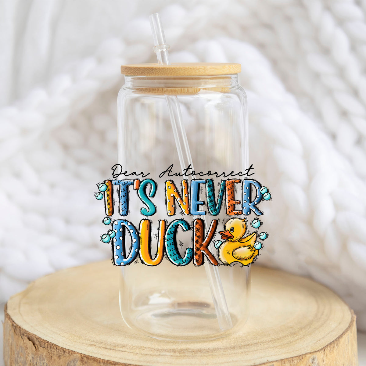 Dear Autocorrect It's Never Duck design on a 16 oz glass tumbler
