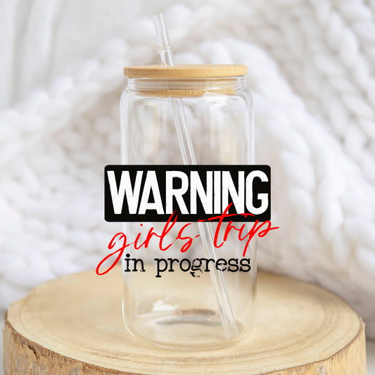 Warning Girls Trip in Progress design on a 16 oz glass tumbler