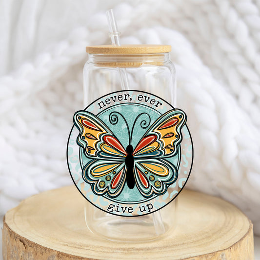 Never Ever Give Up Butterfly design on a 16 oz glass tumbler