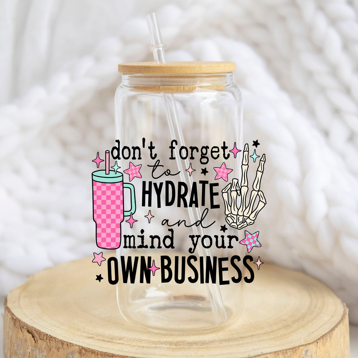 Hydrate and Mind Your Own Business design on a 16 oz glass tumbler